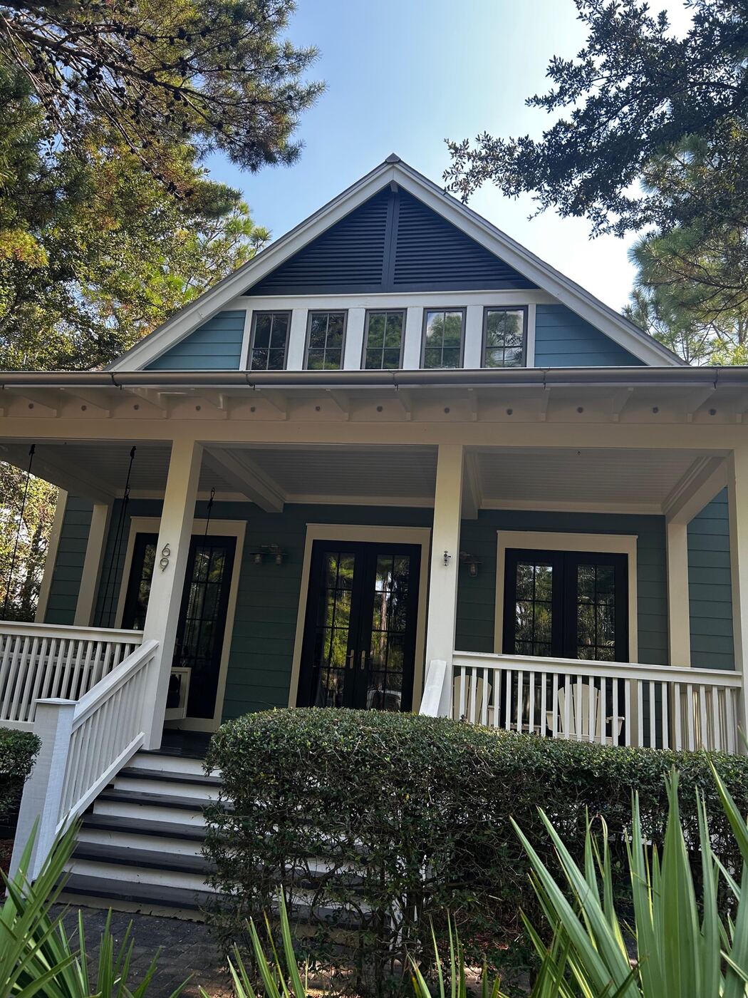 Vacation rental home exterior with clean, welcoming curb appeal after soft washing
